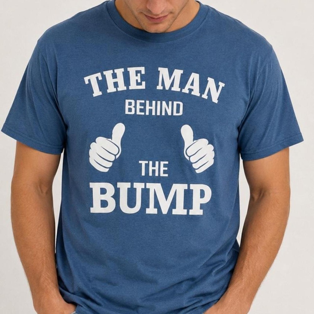 Vintage-style graphic tee featuring the fun "The Man Behind The Bump"